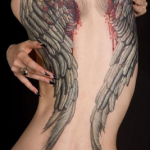 embedded_angel_wings_tattoo_for_girls